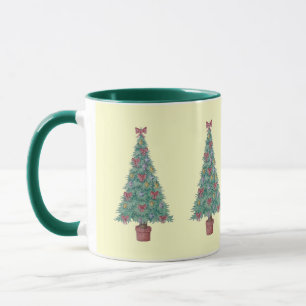 Weihnachtsbaum mit Dekorationsrot beugt Tasse