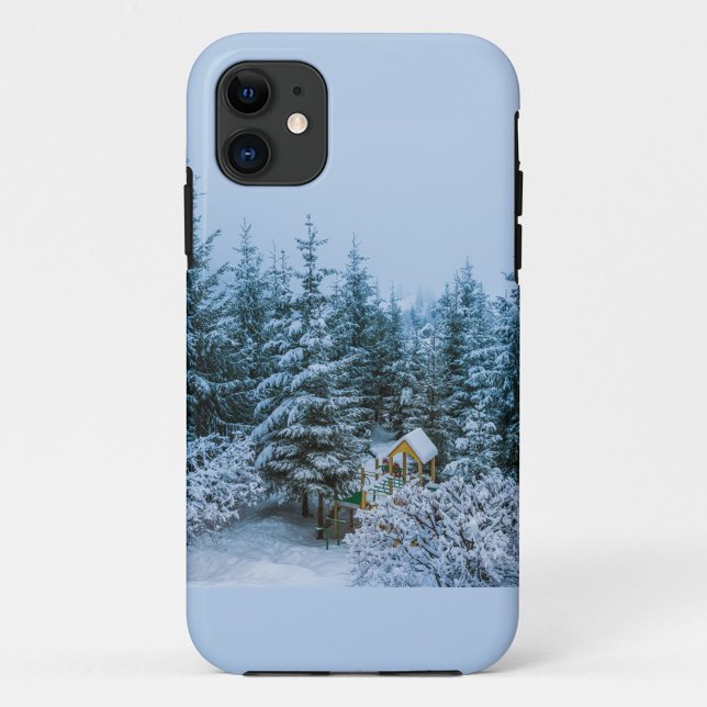 Weihnachtsbaumen iPhone Case (A photograph of a light blue phone case with a winter scene on the back.)