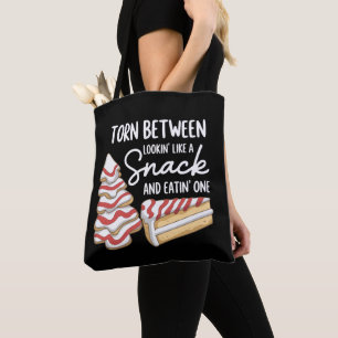 Weihnachtsbaumkuchen hin- und hergerissen zwischen tasche