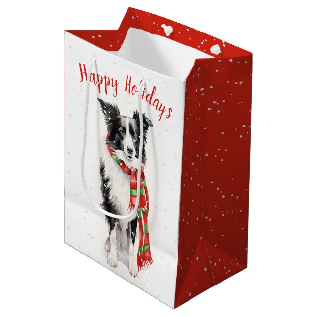 Weihnachtsbräunungskollie in Schneeflocken Mittlere Geschenktüte (Vorderseite Schrägansicht)