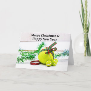 Weihnachtsdekoration im Tennis mit Ball und Band Karte