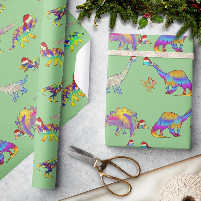 Weihnachtsdinosaurier Tragen von Weihnachtsmannmüt Geschenkpapier (Colorful Christmas dinosaurs wearing santa hats holiday wrapping paper)