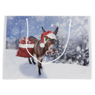 Weihnachtsdonkey mit lustigem rotem Hut Große Geschenktüte