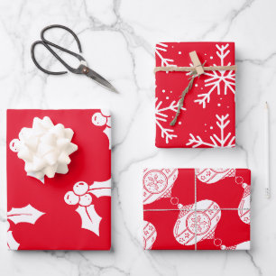 Weihnachtselemente auf roten Umschlagpapier-Blätte Geschenkpapier Set