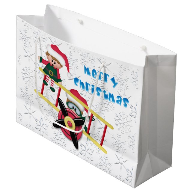 Weihnachtself Flugzeug große Geschenktasche Große Geschenktüte (Vorderseite Schrägansicht)