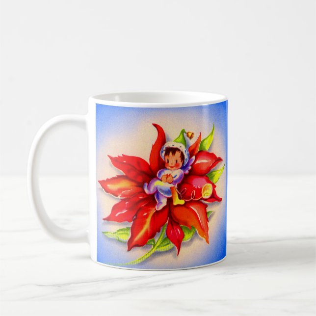 Weihnachtself in einer Poinsettie Kaffeetasse (Links)