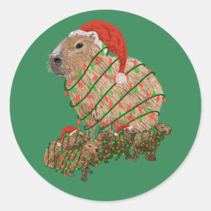 Weihnachtsfamilie Capybara eingewickelt in Lichter Runder Aufkleber