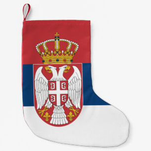 Weihnachtsfeiertage mit der Flagge Serbiens Kleiner Weihnachtsstrumpf