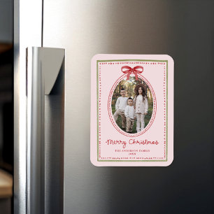 Weihnachtsfoto mit roter Schleife und rosafarbenem Magnet