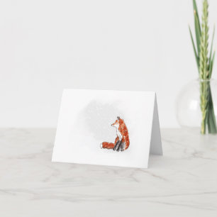Weihnachtsfox im Schneefall sitzen Feiertagskarte