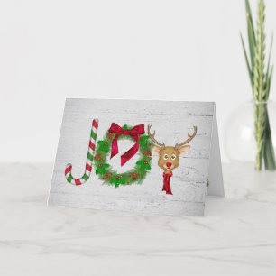 Weihnachtsfreude auf grauem rustikalem Holz mit Sc Karte