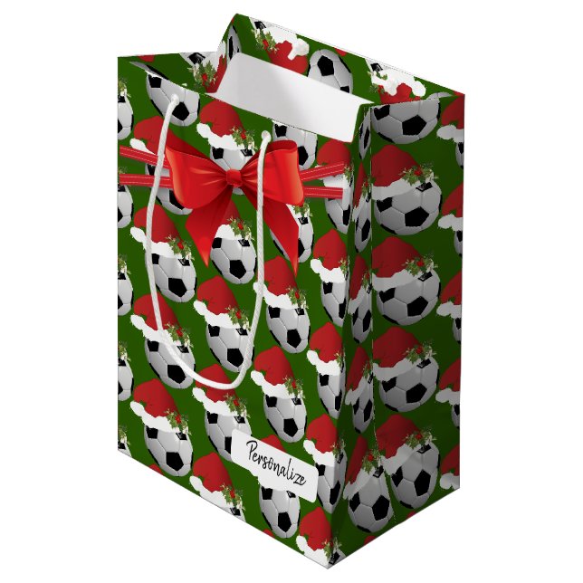WeihnachtsFußball-Muster Mittlere Geschenktüte (Vorderseite Schrägansicht)