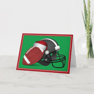 Weihnachtsfußball und Helm Feiertagskarte