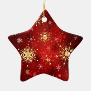 Weihnachtsgoldschneeflocken auf rotem Hintergrund Keramik Ornament