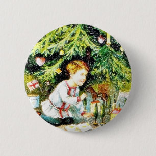Weihnachtsgruß mit einem Jungen, der unter dem De Button
