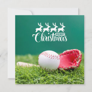 Weihnachtsgrüße mit Geschenken auf grünem Rasen be Karte