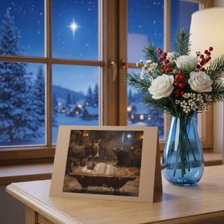 Weihnachtsgrußkarte mit Jesuskind in der Krippe Karte