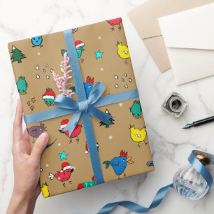 Weihnachtshühner auf goldenem Geschenkpapier