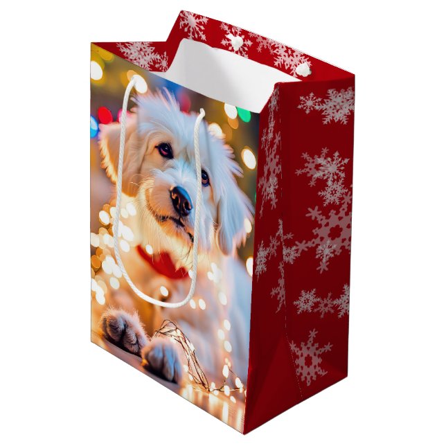 Weihnachtshund in verschlungenen Lichtern Mittlere Geschenktüte (Vorderseite Schrägansicht)