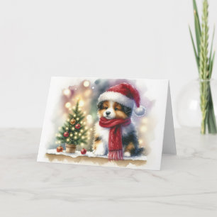 Weihnachtshund mit Weihnachtsmannmütze und rotem S Karte