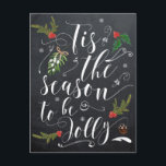 Weihnachtskarte in der Saison zu fröhlich Feiertagspostkarte<br><div class="desc">Chalkboard Effekt Weihnachtspostkarte mit "Das ist die Jahreszeit,  um jolly" Stimmung und Heilige,  Beeren und Schneeflocken Akzente.  Fügen Sie Ihre eigene Nachricht auf der Rückseite ein.
Ideal für alle.  Matching Artikel mit diesem Design in meinem Shop,  wie Geschenkartikel und Grußkarten.</div>