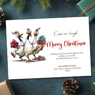 Weihnachtskarte mit albernen Gänsen und spielerisc Feiertagskarte