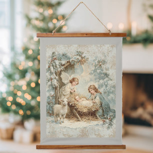 Weihnachtskarte mit Baby Jesus in einer Krippe und Wandteppich Mit Holzrahmen
