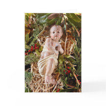 Weihnachtskarte mit Kind in der Krippe