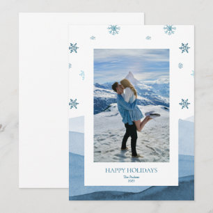 Weihnachtskarte mit verschneitem blauen Urlaubsfot Einladung