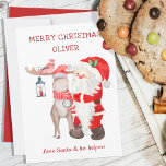 Weihnachtskarte vom Weihnachtsmann & Helfer bearbe<br><div class="desc">Weihnachtskarte vom Weihnachtsmann - personalisiert mit dem Namen Ihres Kindes. Der gesamte Wortlaut ist editierbar und lautet derzeit "fröhliche Weihnachten [Name] .. Liebe Santa und seine Helfer". Die Aquarellgestaltung umfasst Santa,  Rentier und Kardinal.</div>
