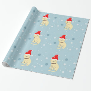 Weihnachtskatze mit Hut auf blau Geschenkpapier