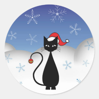 Weihnachtskatze mit Schneeflocken Runder Aufkleber