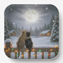 Weihnachtskatzen kuscheln auf einem schneebedeckte pappteller