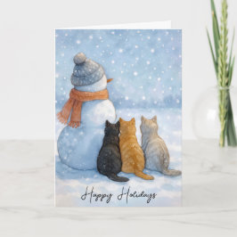 Weihnachtskatzen sitzen mit einem Schneemann auf e Karte