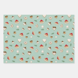 Weihnachtskekse auf grün und rosa geschenkpapier set