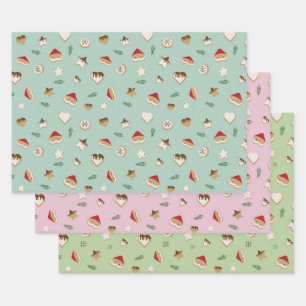 Weihnachtskekse auf grün und rosa geschenkpapier set