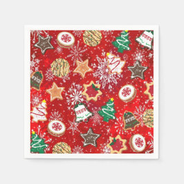 Weihnachtskekse und Schneeflocken auf Rot Serviette