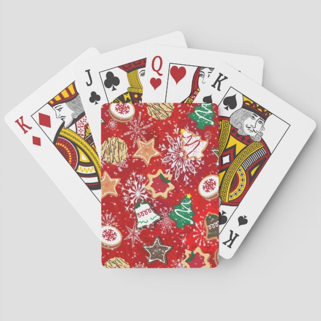 Weihnachtskekse und Schneeflocken auf Rot Spielkarten (Rückseite)