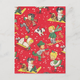 Weihnachtskinder im Schnee spielen Feiertagspostkarte