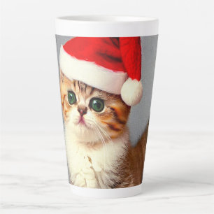 Weihnachtskitten in Weihnachtsmannmütze Milchtasse