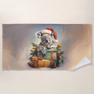 Weihnachtskoala mit Geschenken und Stechpalme Strandtuch