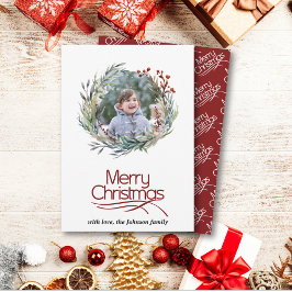 Weihnachtskranz, grüne Blätter und Beeren Foto Feiertagskarte