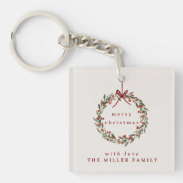 Weihnachtskranz mit rotem Bogen. Schlüsselanhänger