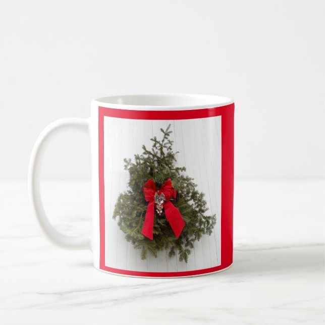 Weihnachtskranz und Roter Bow im Stall Kaffeetasse (Links)