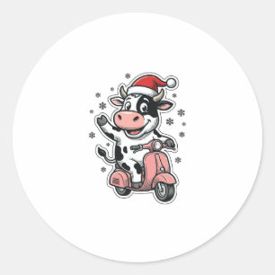 Weihnachtskuh fährt auf rosa Roller Vintage Vektor Runder Aufkleber