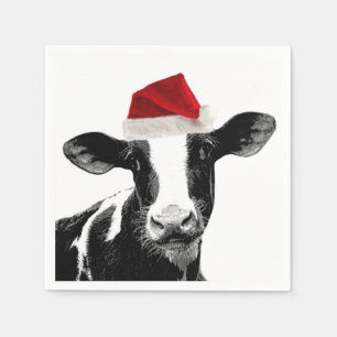 Weihnachtskuh-tragende Weihnachtsmannmütze Serviette
