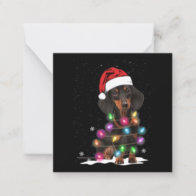 Weihnachtslicht mit Schnee in der Dackel Mitteilungskarte (Vorderseite)