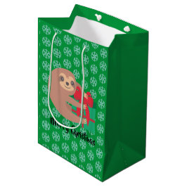 Weihnachtsliegeplatz mit Geschenk Grüner Schneeflo Mittlere Geschenktüte