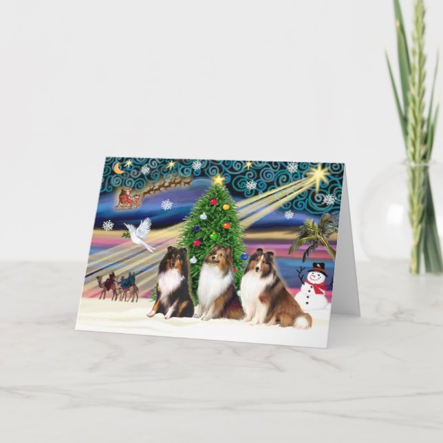 Weihnachtsmagie-Hirsche (drei) Feiertagskarte (Vorderseite)