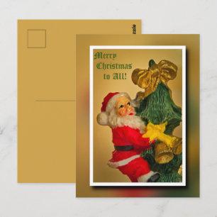 Weihnachtsmann, der den Weihnachtsbaum erklimmt - Postkarte